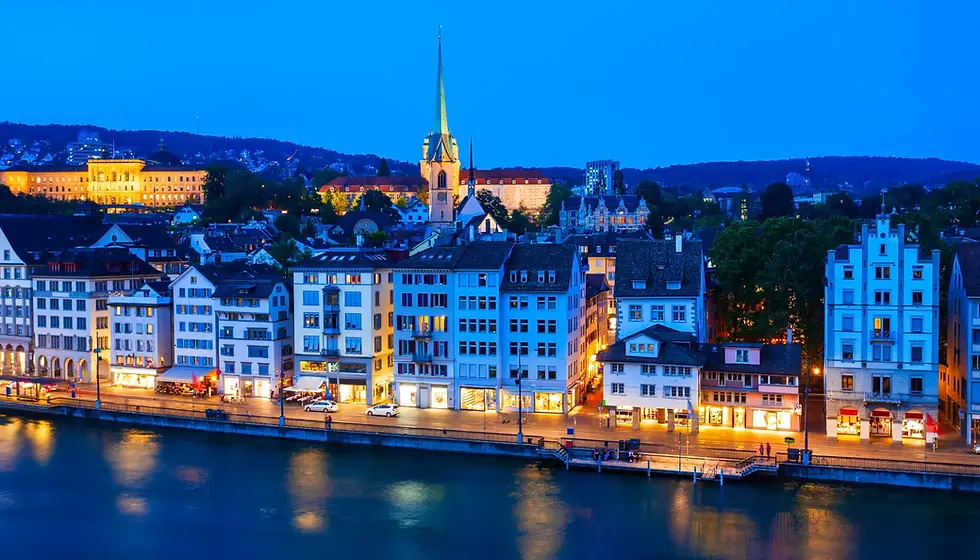 A row of commercial buildings at dusk representing the diverse rebuild values in UK city centres