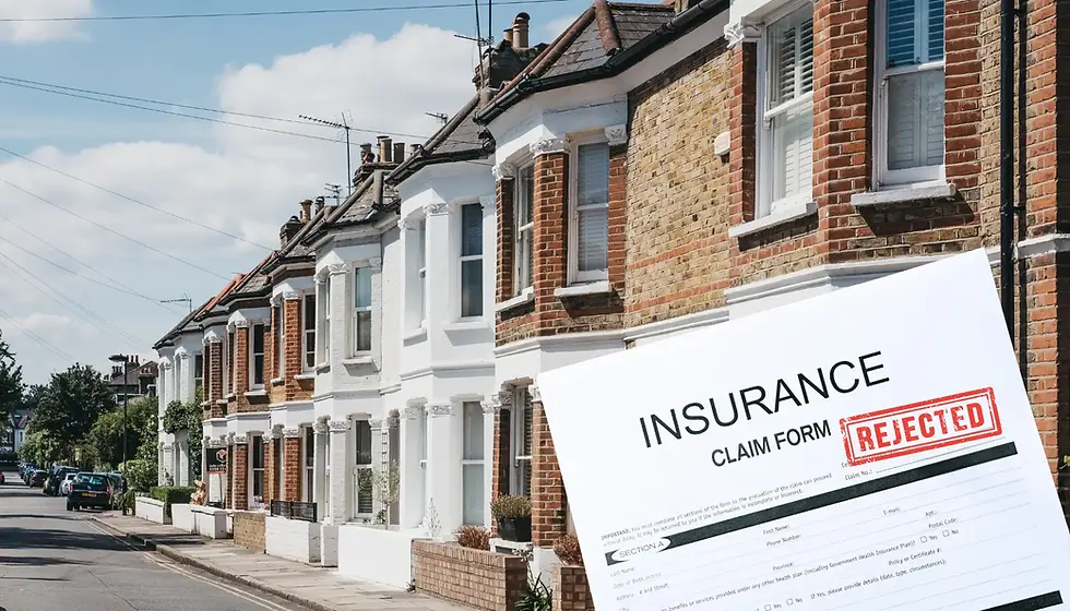 Row of brick houses under a blue sky, large insurance claim form stamped "REJECTED" in the foreground, conveying denial or setback.
